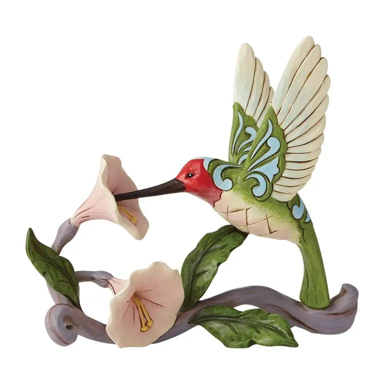 Jim Shore's Whimsical Hummingbird Haven Figurine: A Burst of Color and Craftsmanship